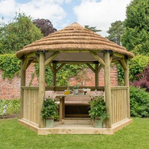 Forest Garden 3.6m Hexagonal Wooden Garden Gazebo with Thatched Roof - Furnished with Table, Benches and Cushions (Cream)