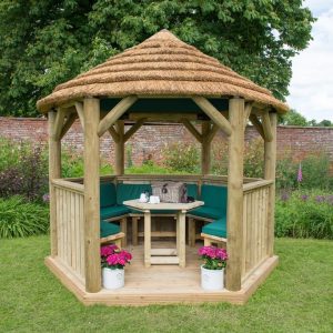 Forest Garden 3m Hexagonal Wooden Garden Gazebo with Thatched Roof - Furnished with Table, Benches and Cushions (Green)