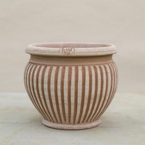 Curved ribbed terracotta pot