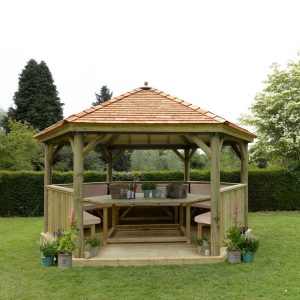 Forest Garden 4.7m Hexagonal Wooden Garden Gazebo with Cedar Roof - Furnished with Table, Benches and Cushions (Cream)