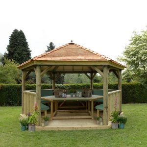 Forest Garden 4.7m Hexagonal Wooden Garden Gazebo with Cedar Roof - Furnished with Table, Benches and Cushions (Green)