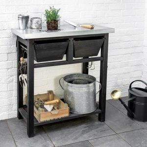 Grey wooden potting bench with storage