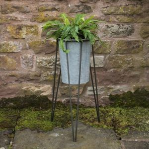 Tall galvanised metal planter with stand