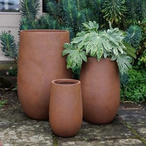 Set of three column planters in rust brown